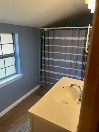 a view of a room with a window