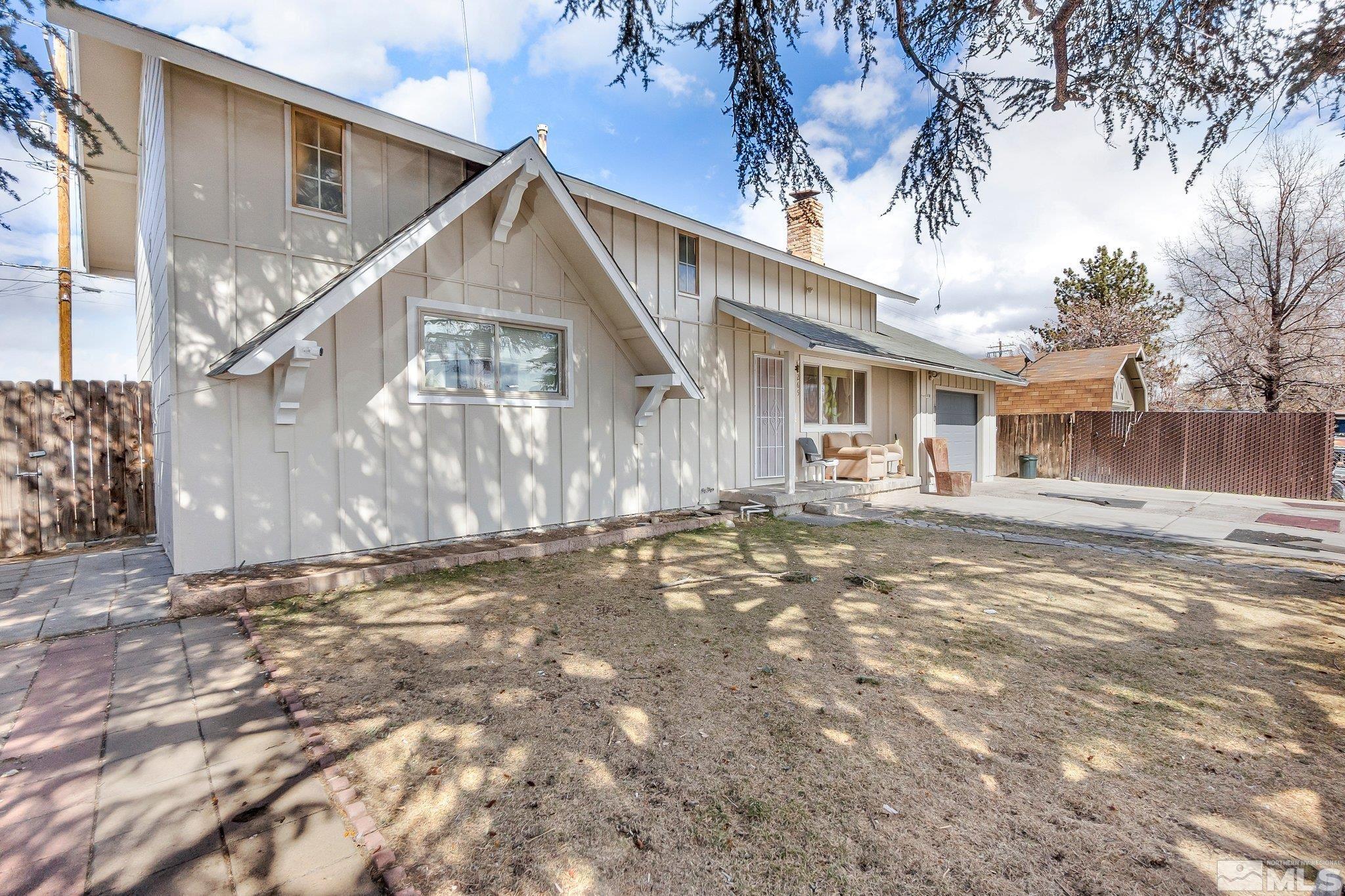 2265 Mannington Street Reno, NV 89512 - Photo 19 of 25 a view of a house with a yard
