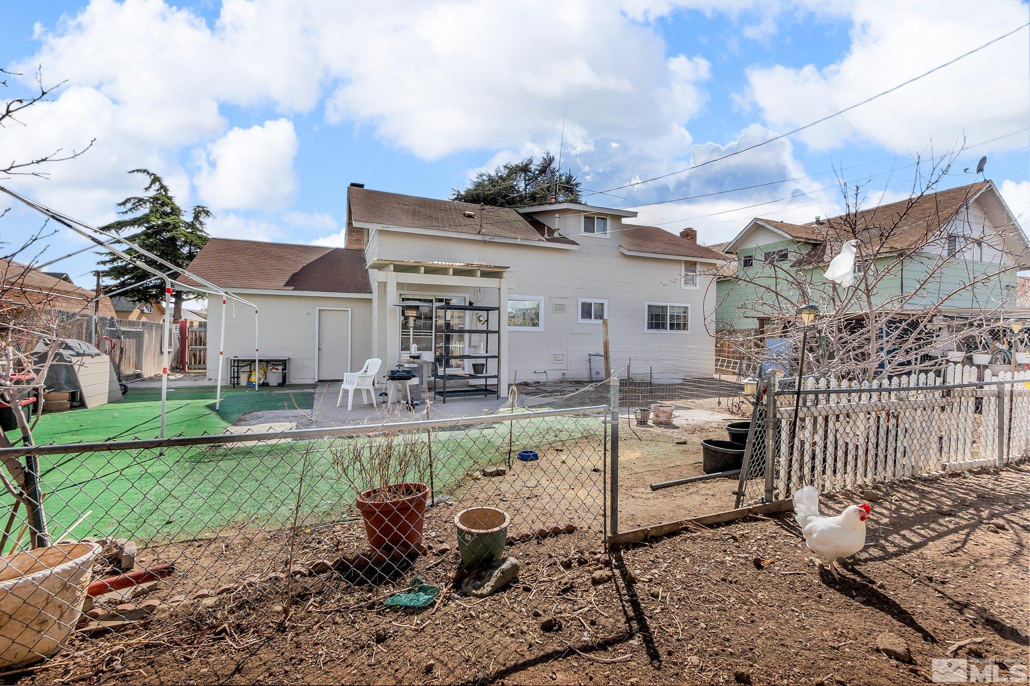 2265 Mannington Street Reno, NV 89512 - Photo 20 of 25 a view of a house with backyard and sitting area