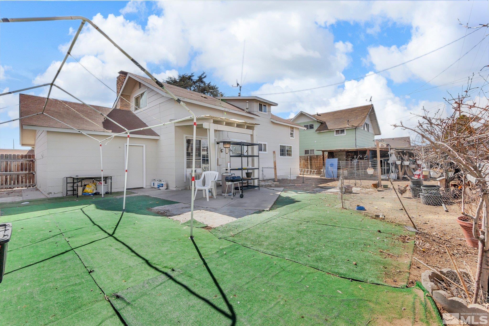 2265 Mannington Street Reno, NV 89512 - Photo 22 of 25 a view of a house with backyard porch and sitting area