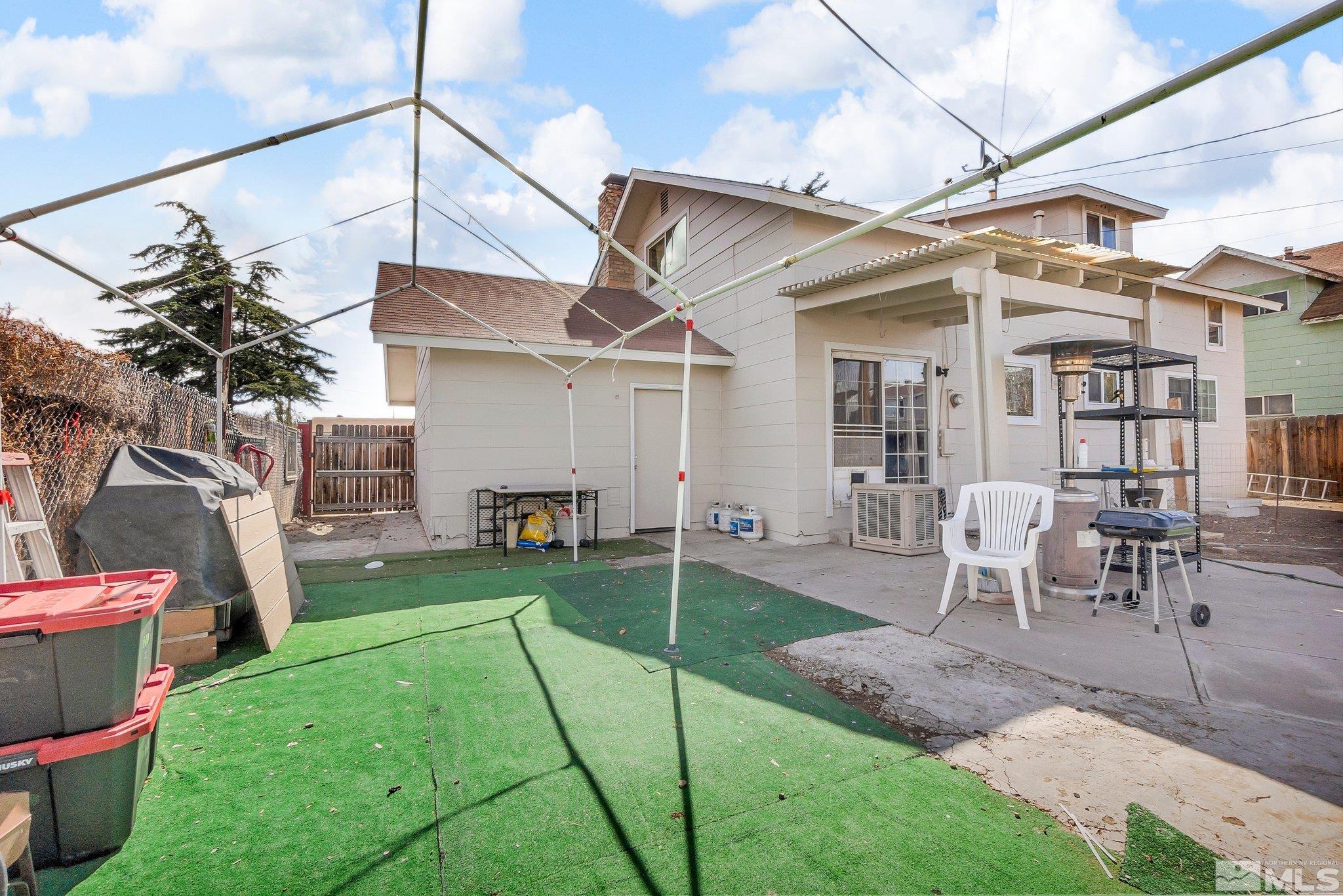2265 Mannington Street Reno, NV 89512 - Photo 24 of 25 a view of a house with a yard