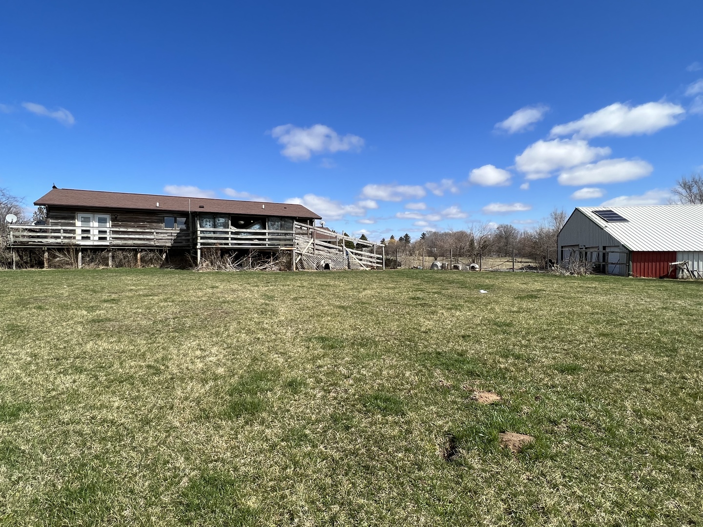 1451 Riverview Road Amboy, IL 61310 - Photo 54 of 60 a view of a lake with an outdoor space