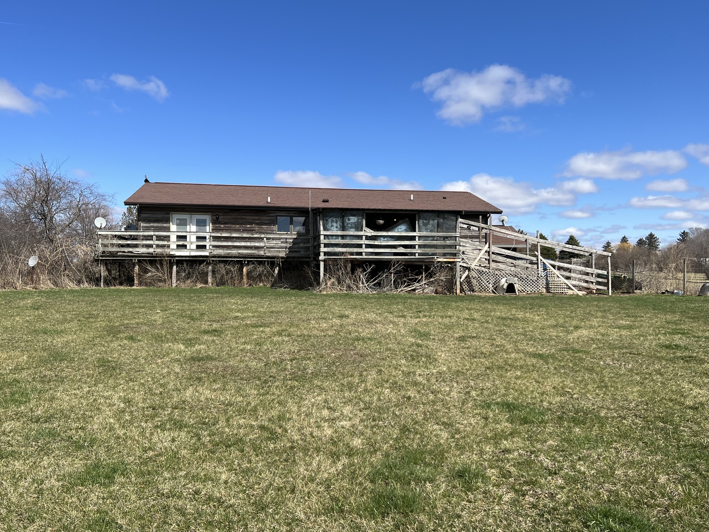 1451 Riverview Road Amboy, IL 61310 - Photo 55 of 60 a view of a house with a big yard