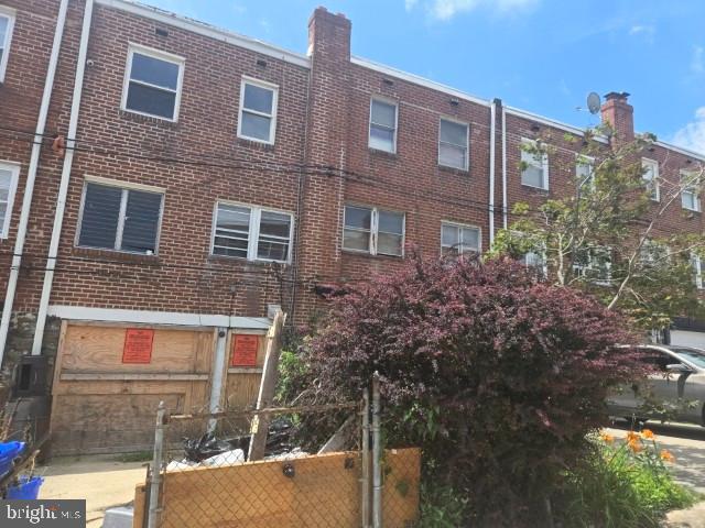 8305 Temple Road Philadelphia, PA 19150 - Photo 14 of 14 a front view of a house with a yard
