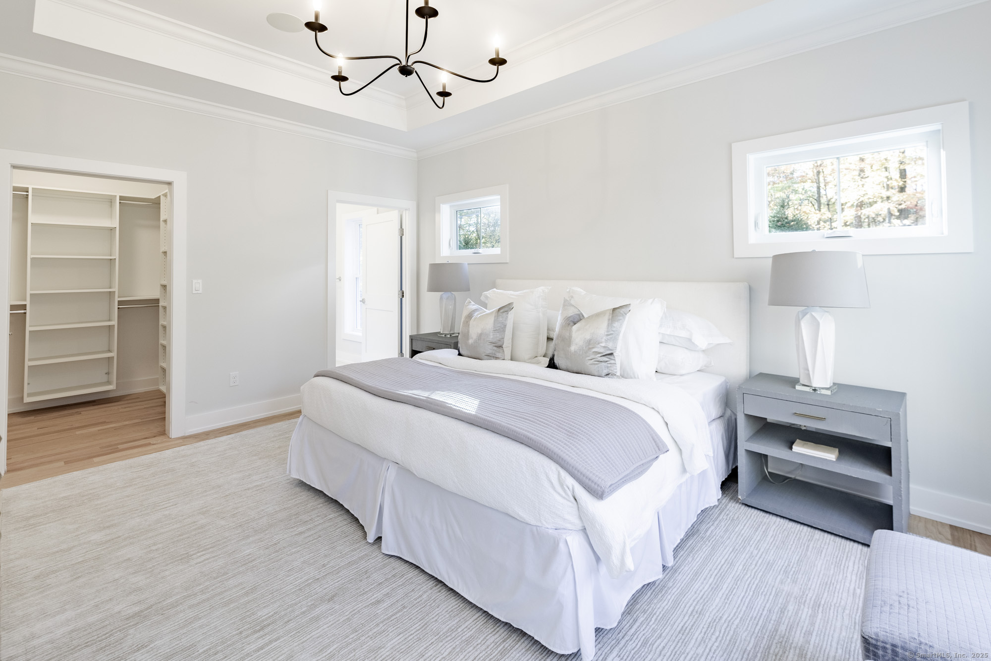 3 Pine Ridge, Unit 23 Middlebury, CT 06762 - Photo 12 of 28 a bedroom with bed and window
