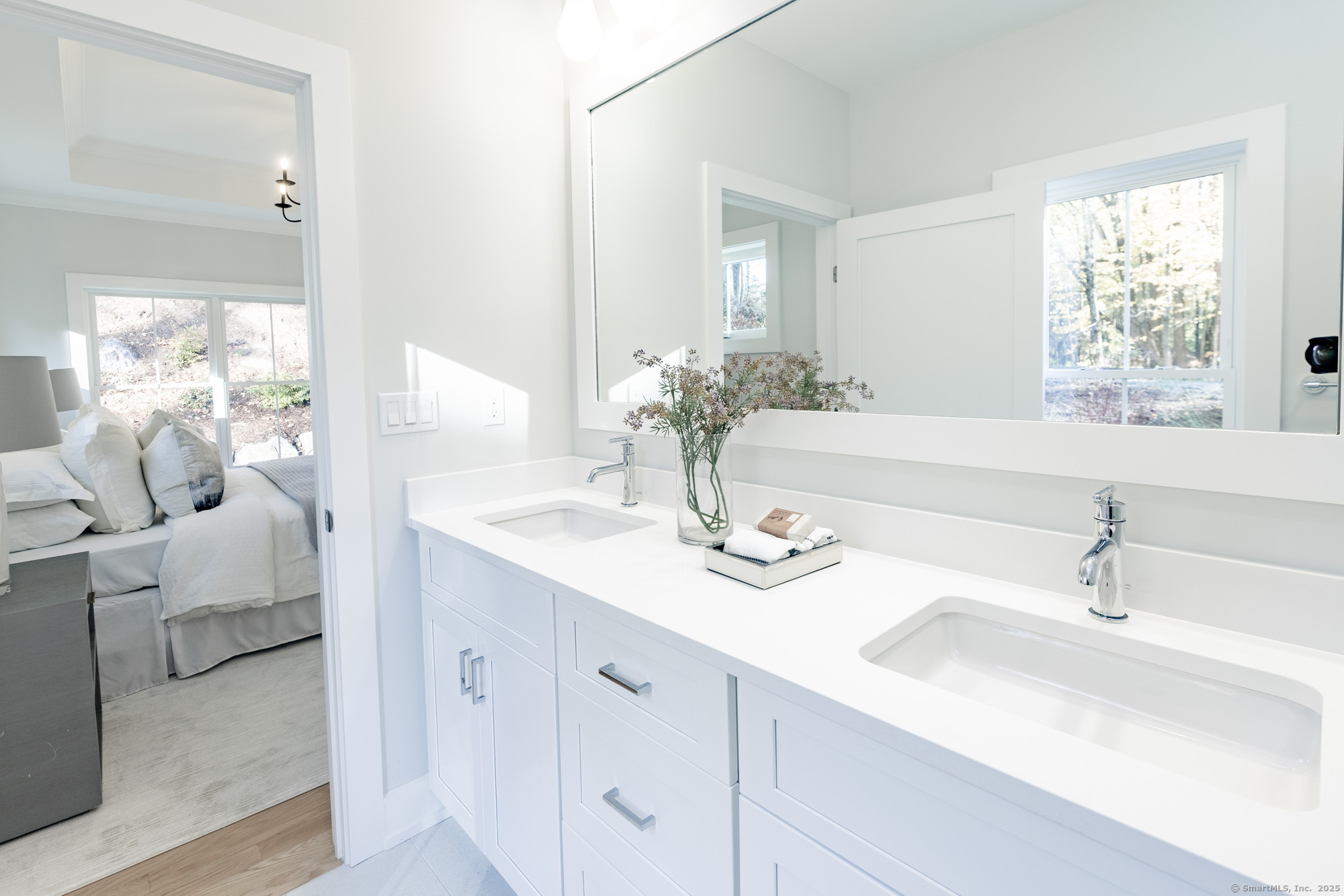 3 Pine Ridge, Unit 23 Middlebury, CT 06762 - Photo 15 of 28 a bathroom with a sink and a mirror