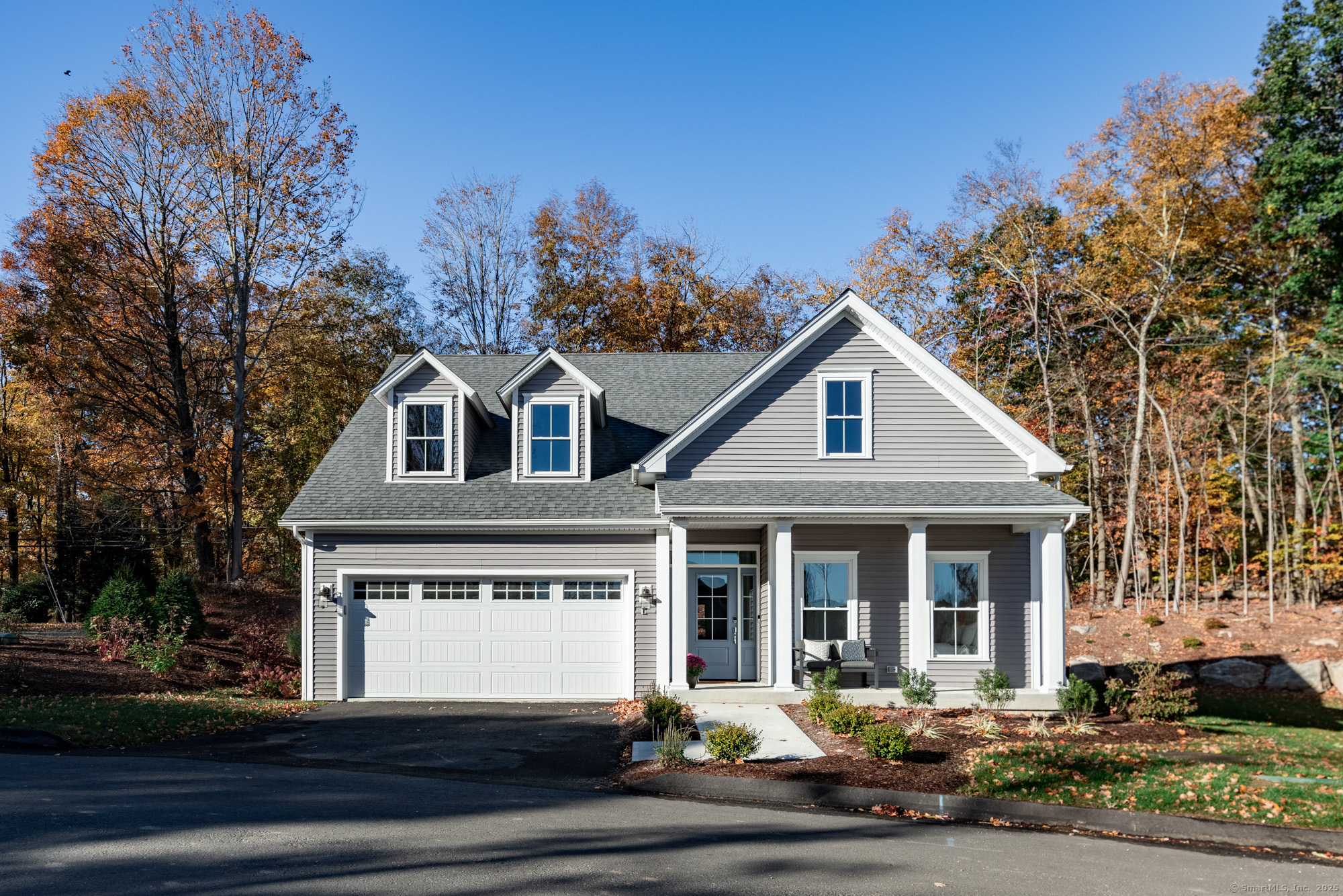 3 Pine Ridge, Unit 23 Middlebury, CT 06762 - Photo 22 of 28 a front view of a house with yard
