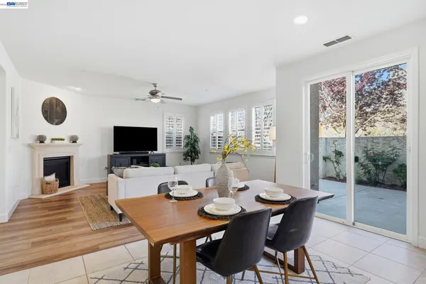 a bedroom with a bed and lamp