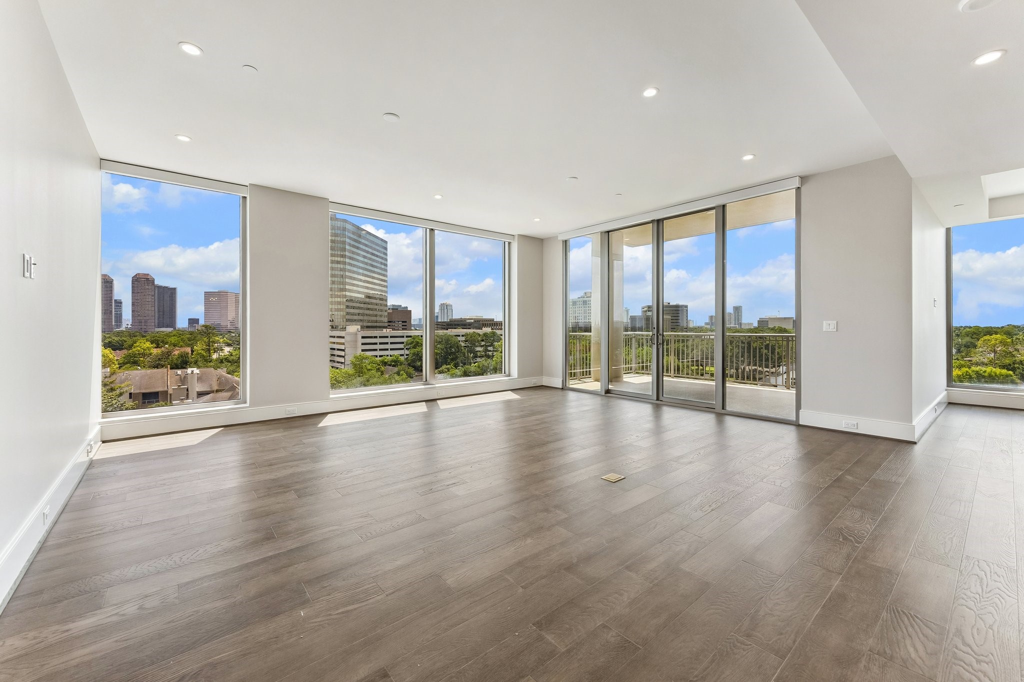 5656 San Felipe Street, Unit 701 Houston, TX 77056 - Photo 4 of 44 Photo of actual living room to convey the spacious layout and the open concept of the living area