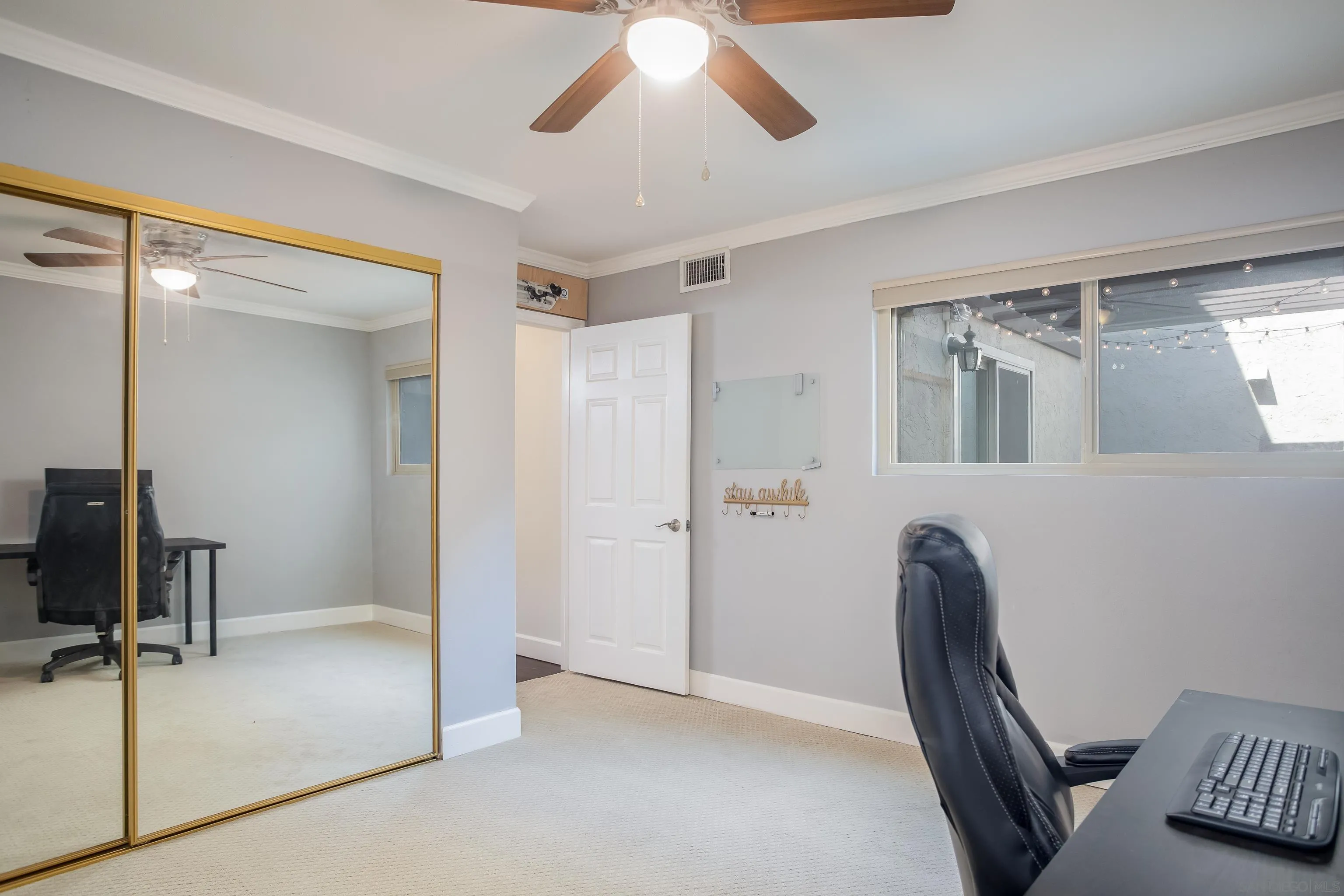 6345 Rancho Mission Road, Unit 3 San Diego, CA 92108 - Photo 27 of 43 a view of a hallway with workspace