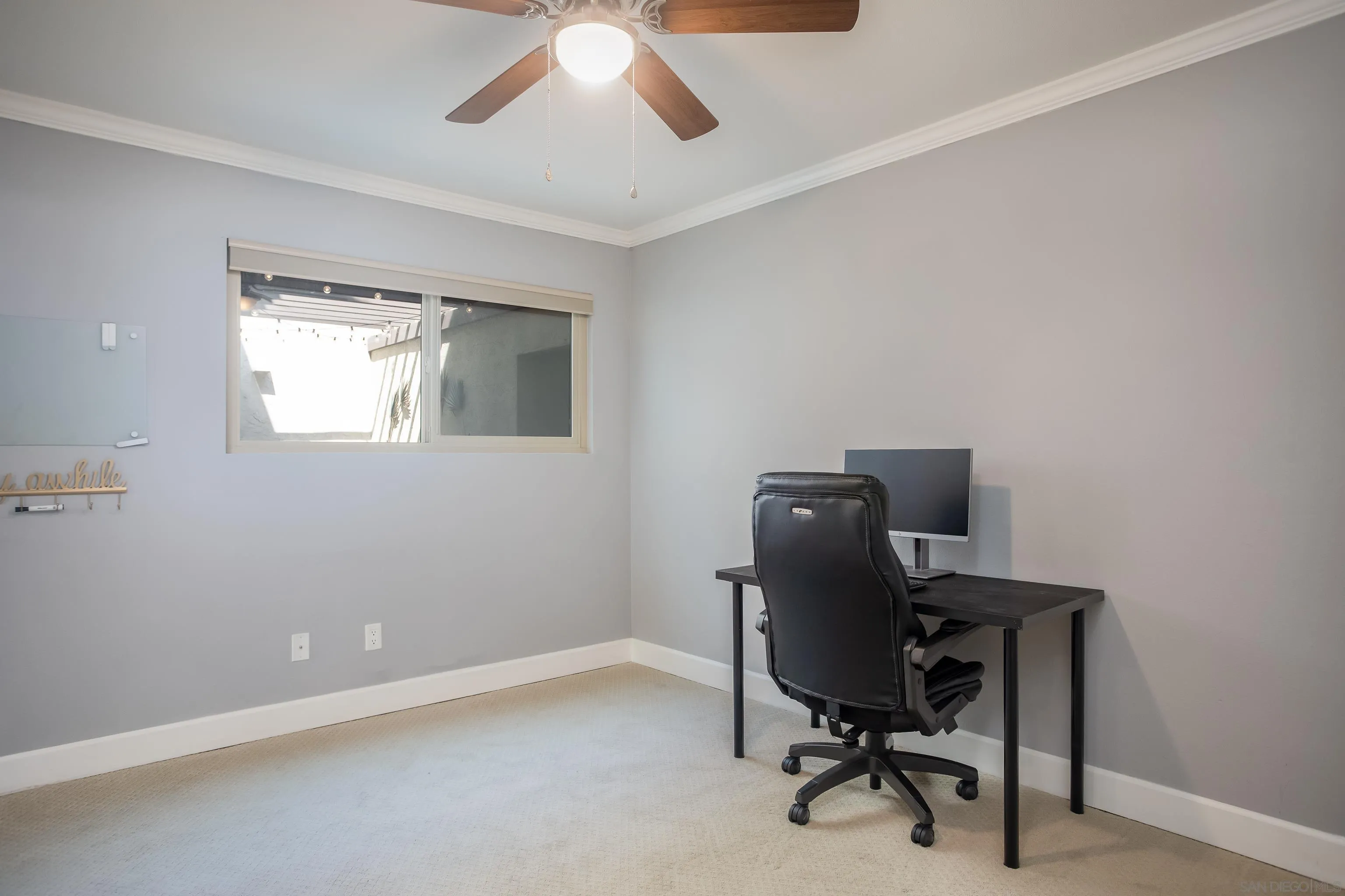 6345 Rancho Mission Road, Unit 3 San Diego, CA 92108 - Photo 29 of 43 a view of a workspace with furniture and a window