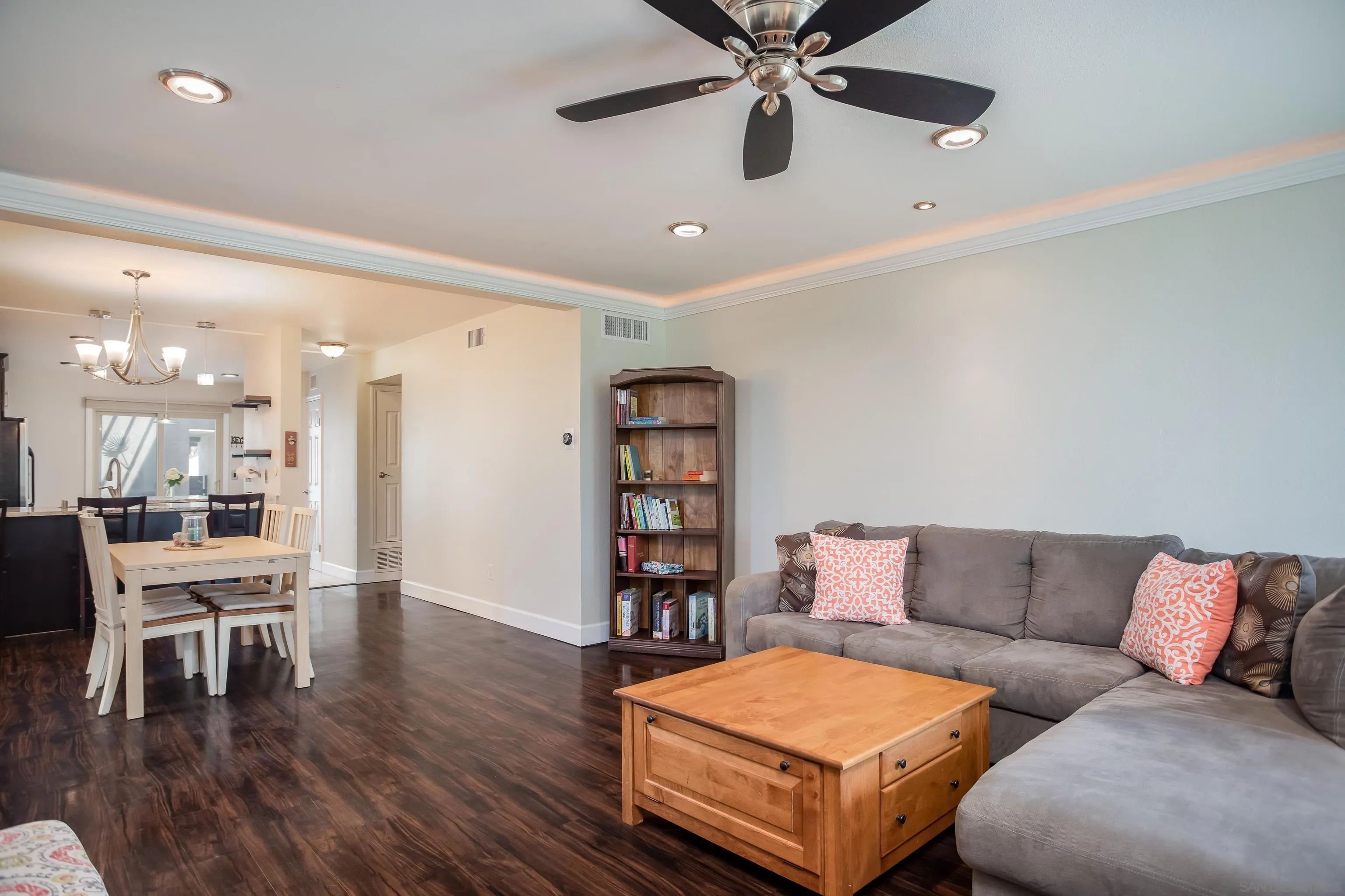 6345 Rancho Mission Road, Unit 3 San Diego, CA 92108 - Photo 10 of 43 a living room with furniture and wooden floor