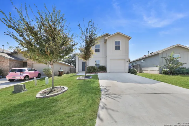 a house view with a garden space