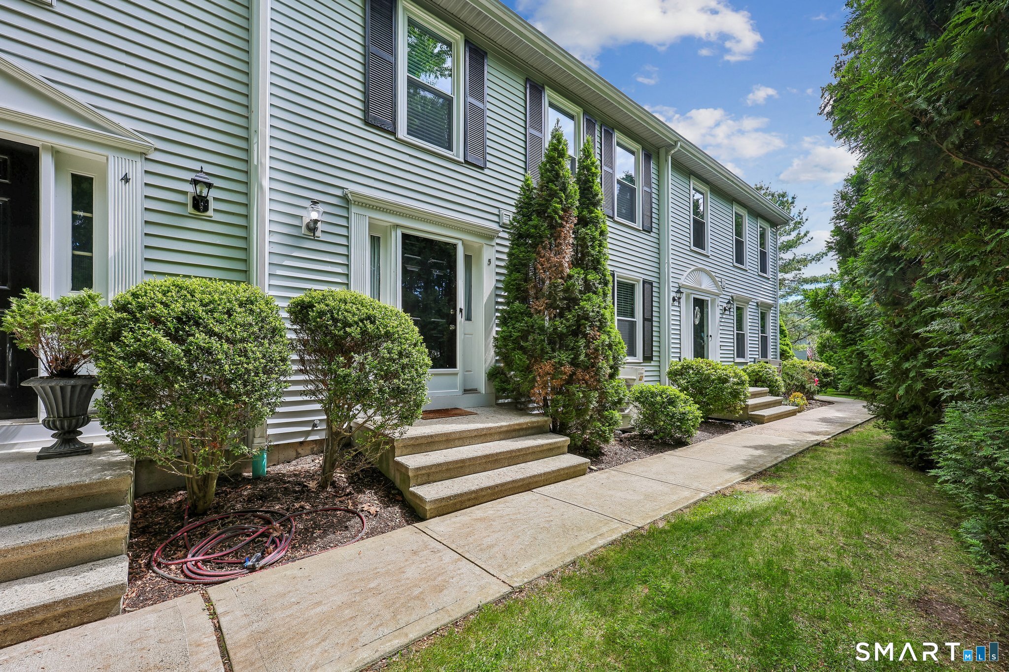 Welcome to unit 5 at Railside Place condominiums in Madison, CT