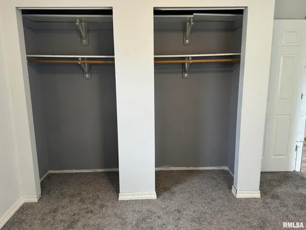 a bathroom with a sink a toilet and a shower