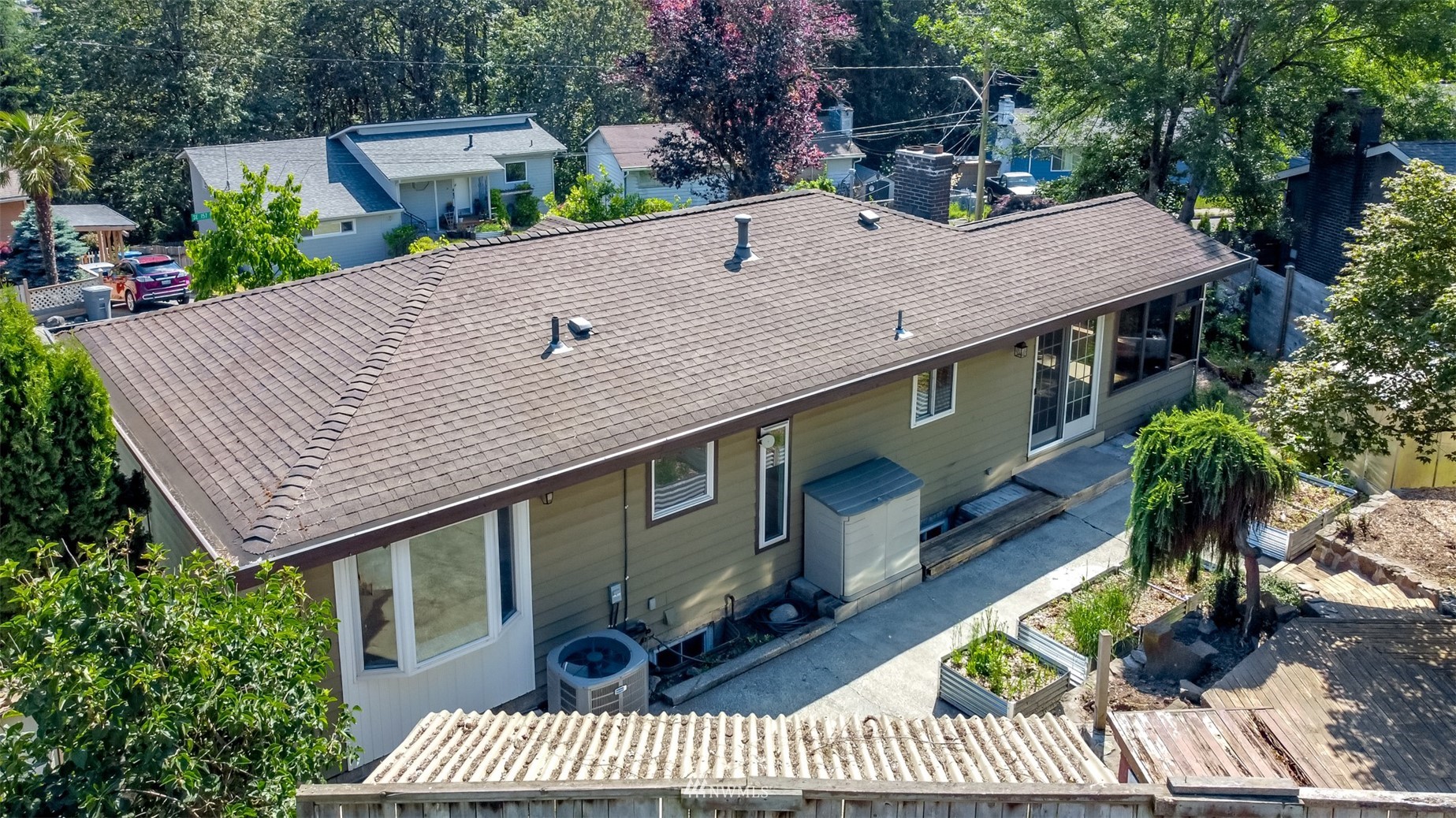 12011 Southeast 157th Place Renton, WA 98058 - Photo 11 of 40 a view of house with roof deck and seating space