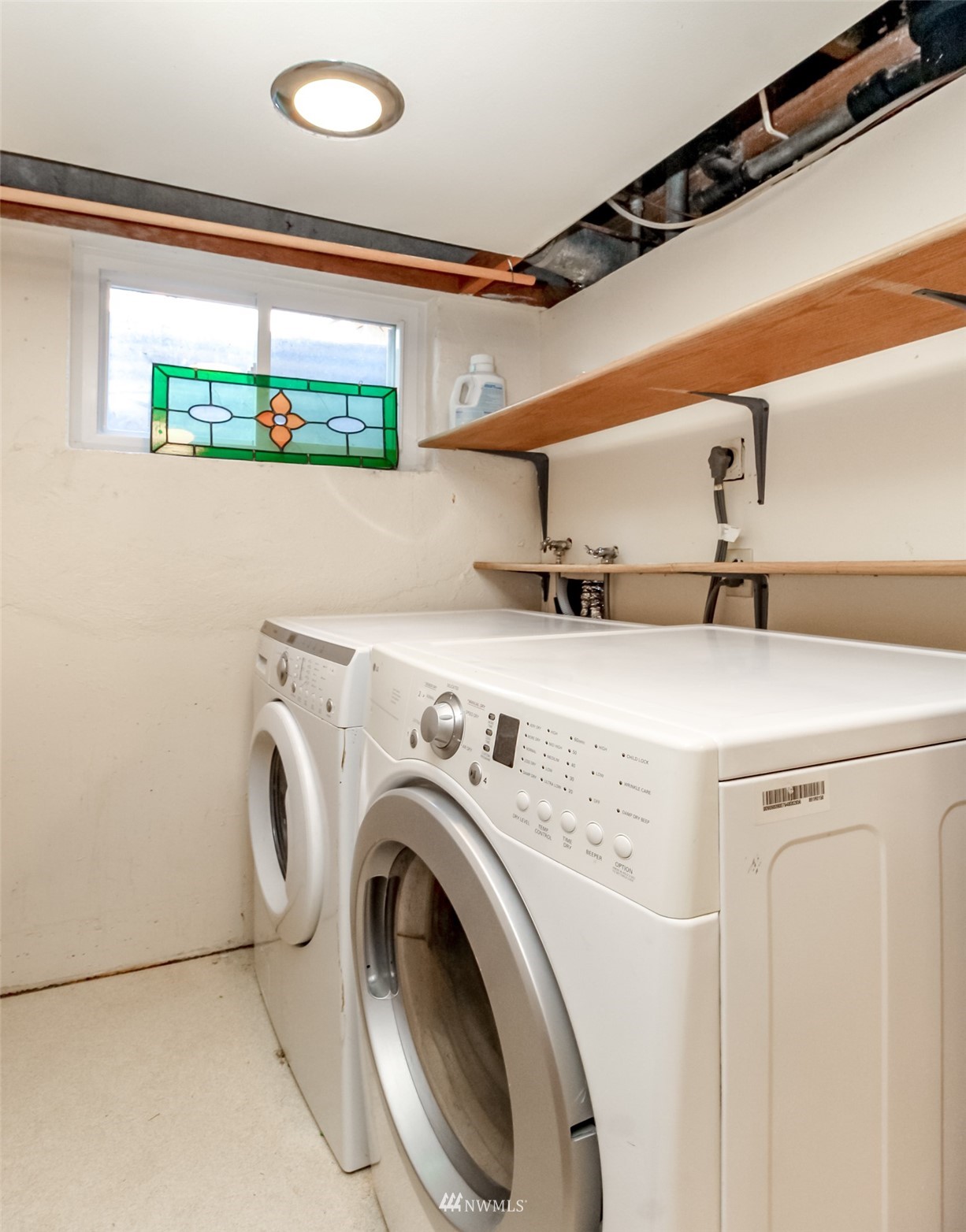 12011 Southeast 157th Place Renton, WA 98058 - Photo 15 of 40 a utility room with dryer and washer