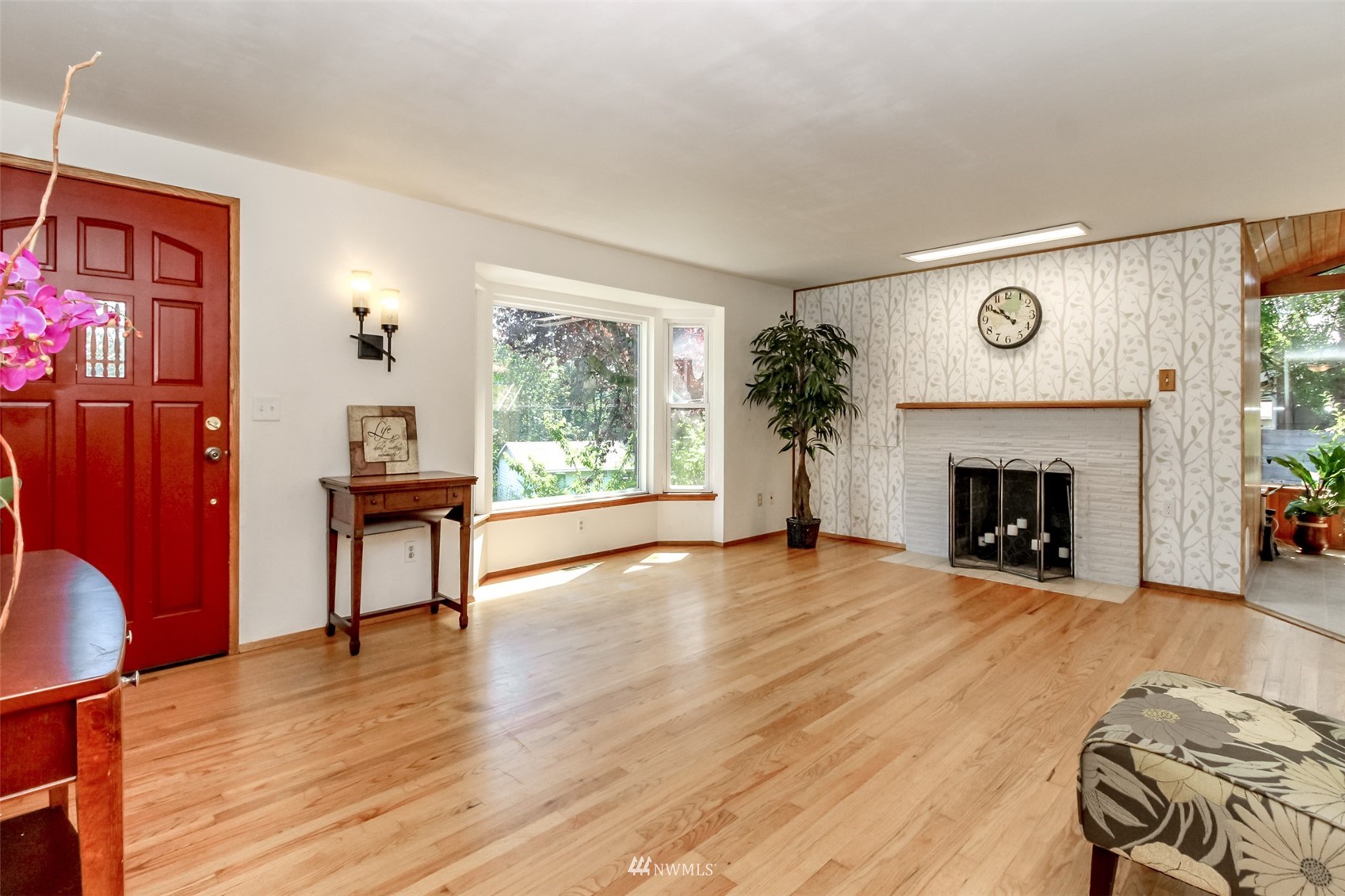 12011 Southeast 157th Place Renton, WA 98058 - Photo 30 of 40 a view of a livingroom with furniture and a fireplace