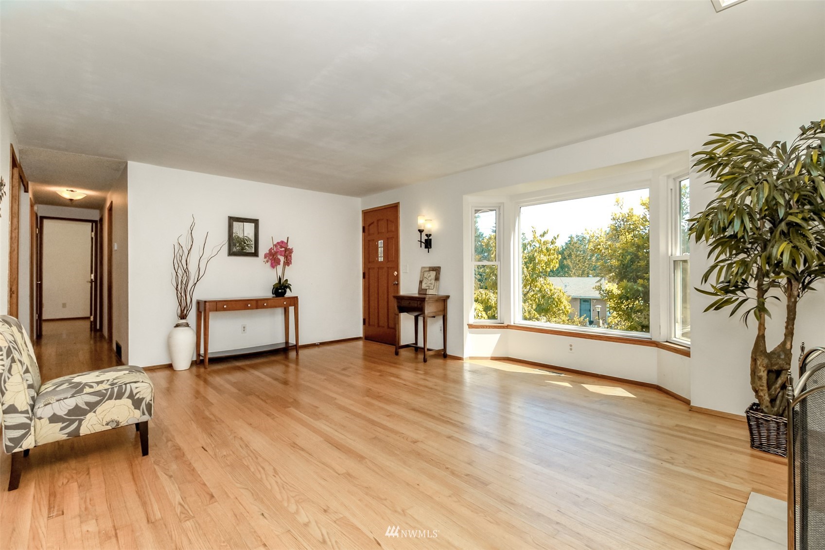 12011 Southeast 157th Place Renton, WA 98058 - Photo 31 of 40 a living room with furniture and a large window