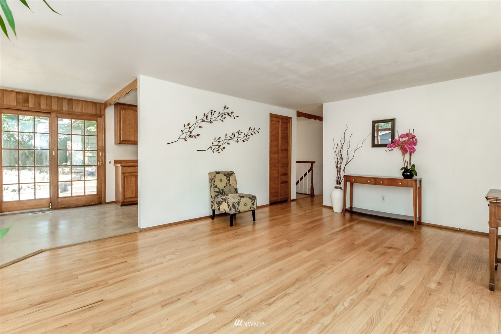 12011 Southeast 157th Place Renton, WA 98058 - Photo 33 of 40 a view of an empty room with window and wooden floor
