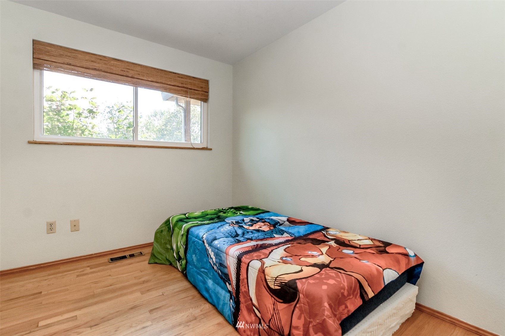 12011 Southeast 157th Place Renton, WA 98058 - Photo 39 of 40 a bedroom with a bed and a window