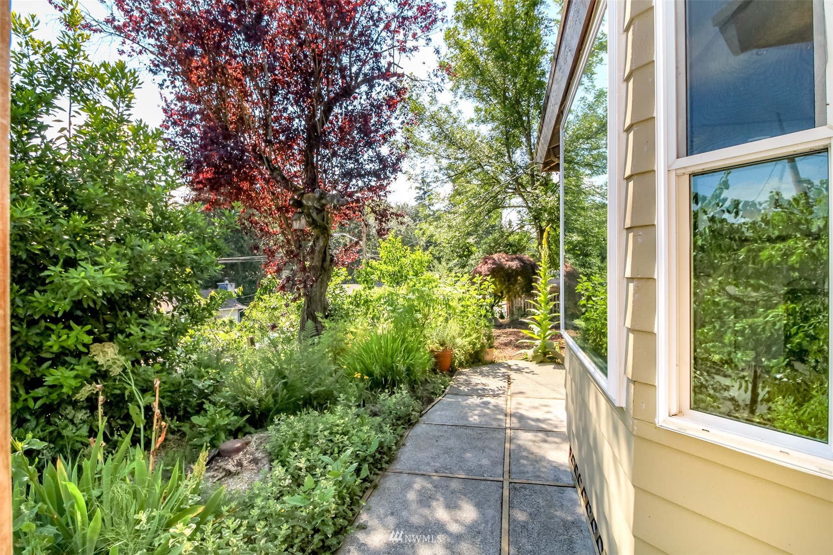 12011 Southeast 157th Place Renton, WA 98058 - Photo 6 of 40 a view of a garden