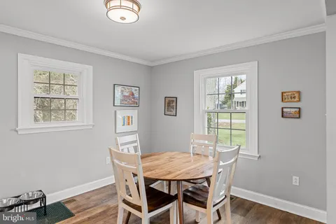 a kitchen with granite countertop a sink and a window