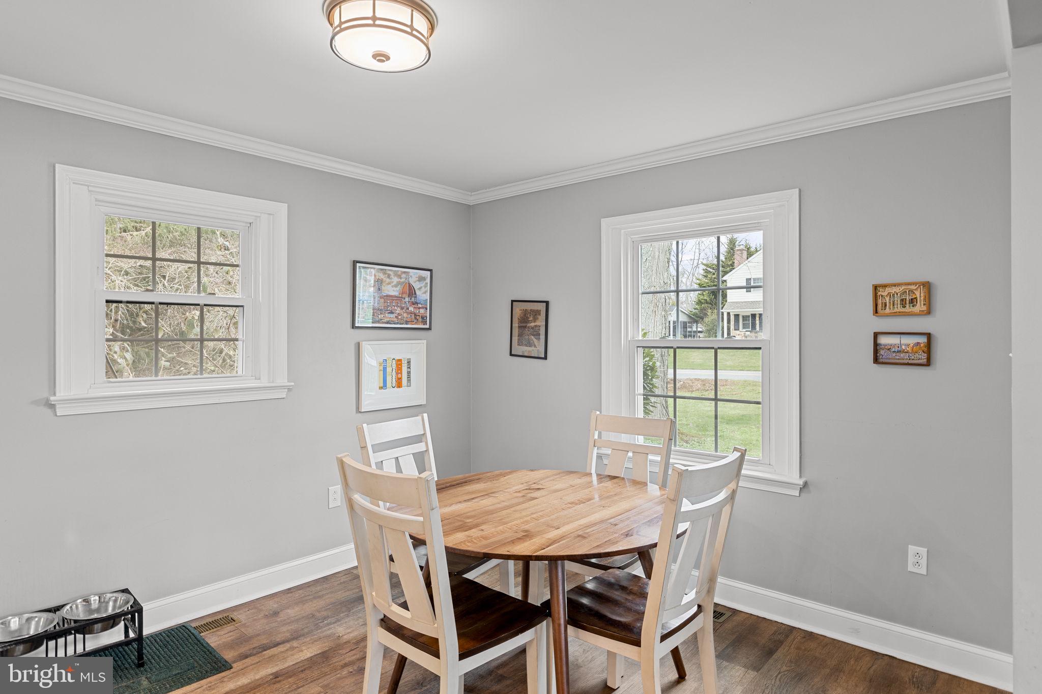 237 Waterloo Avenue Berwyn, PA 19312 - Photo 15 of 58 a view of a dining room with furniture window and wooden floor