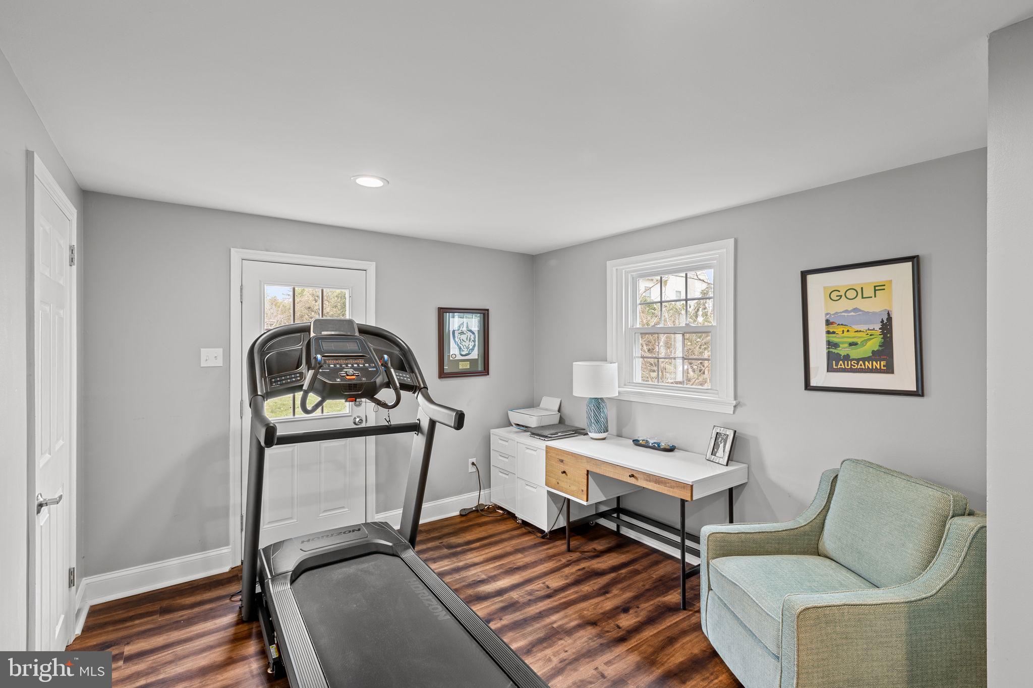 237 Waterloo Avenue Berwyn, PA 19312 - Photo 27 of 58 a living room with furniture a rug and wall painting