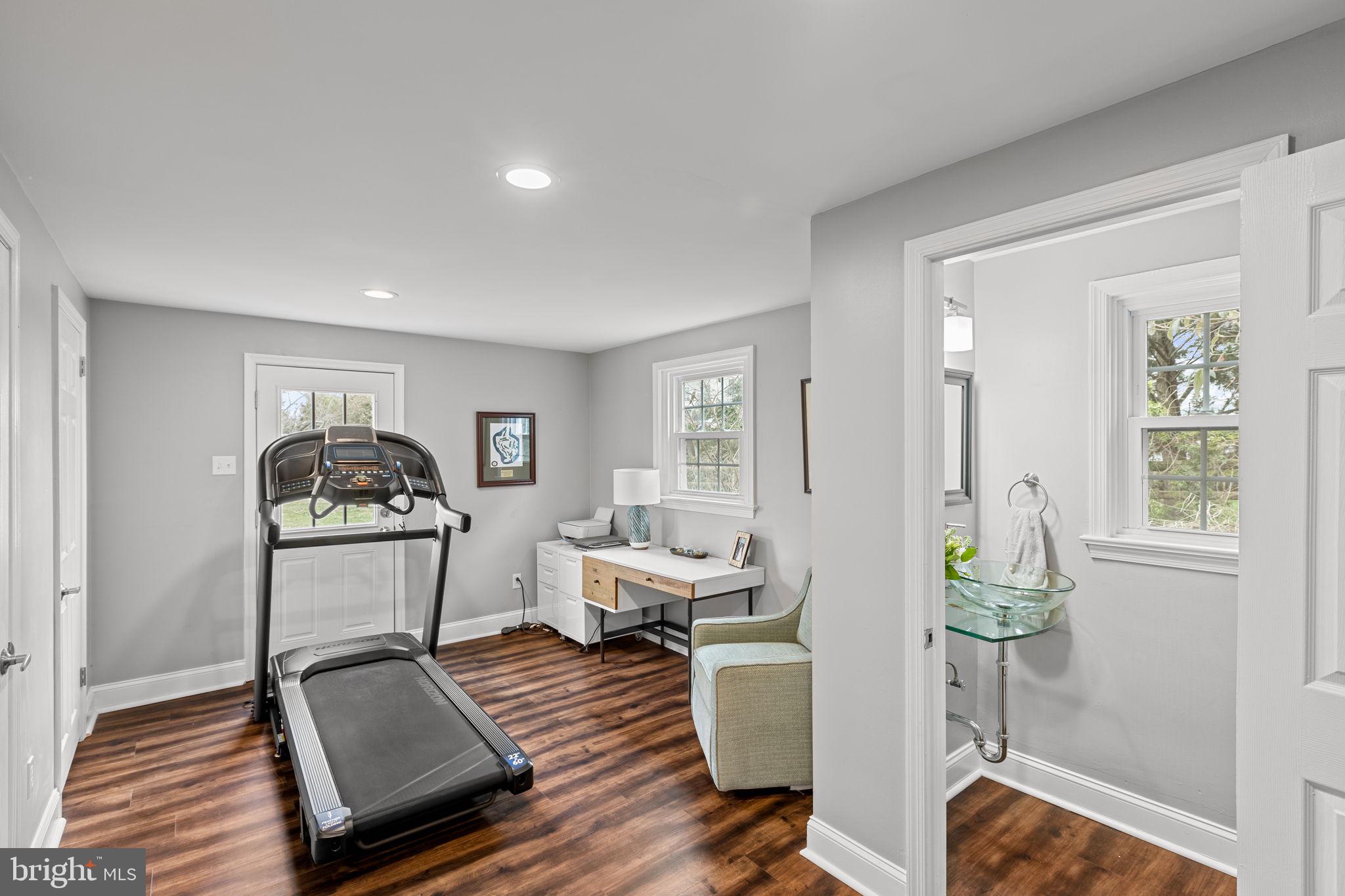 237 Waterloo Avenue Berwyn, PA 19312 - Photo 29 of 58 a living room with furniture and a wooden floor