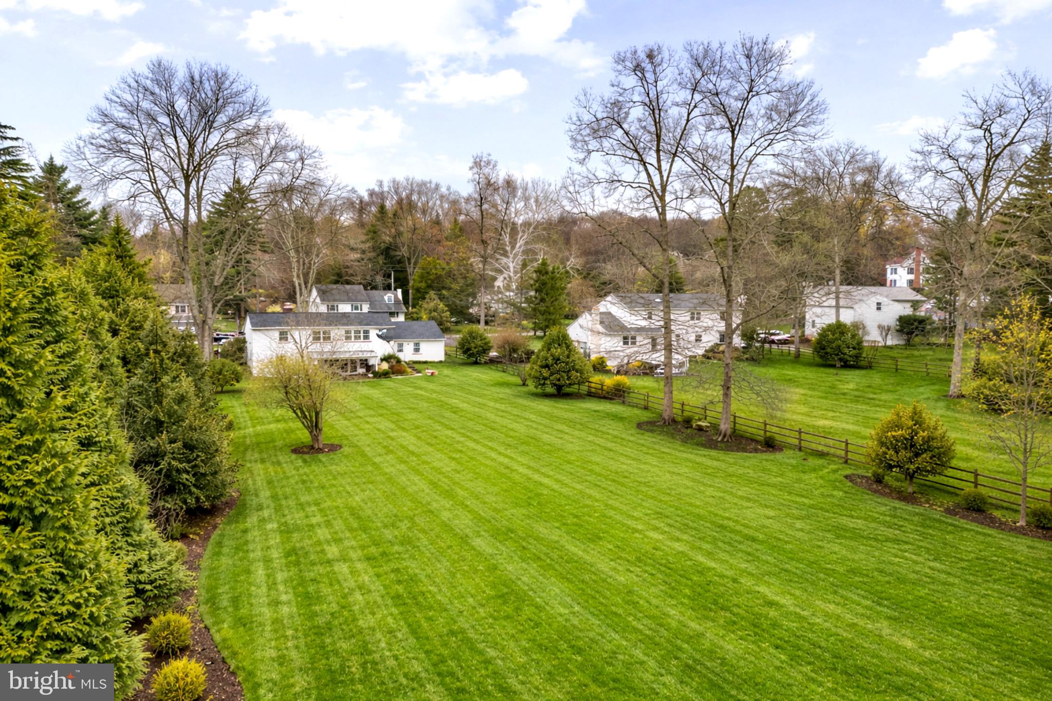 237 Waterloo Avenue Berwyn, PA 19312 - Photo 3 of 58 a backyard of a house with table and chairs