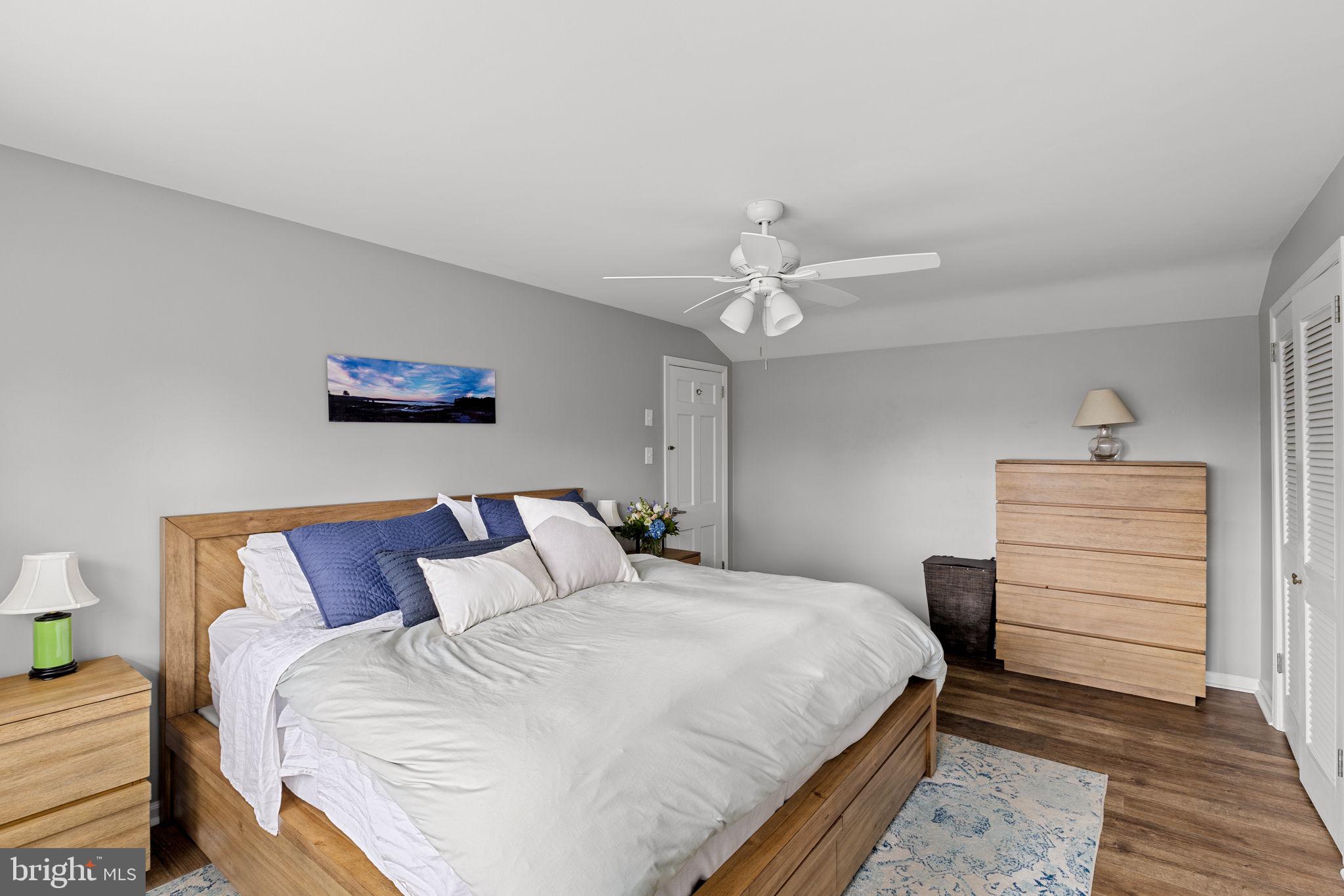 237 Waterloo Avenue Berwyn, PA 19312 - Photo 32 of 58 a bedroom with a bed and a chandelier