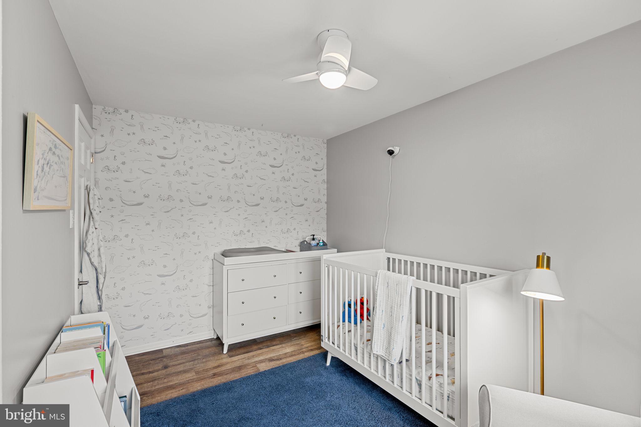 237 Waterloo Avenue Berwyn, PA 19312 - Photo 40 of 58 a bedroom with furniture and wooden floor