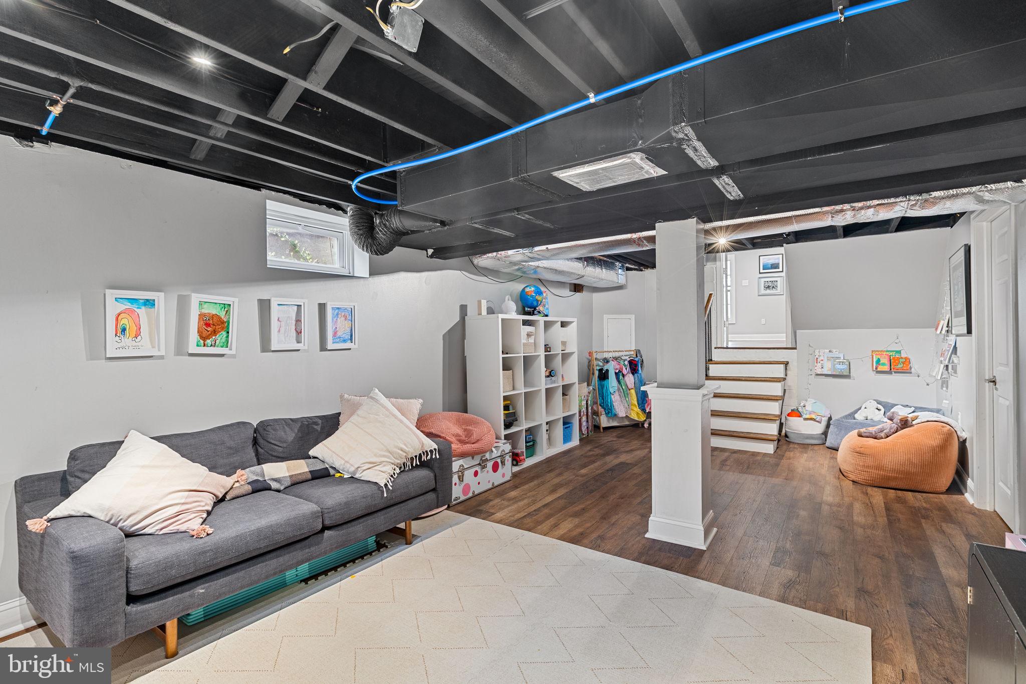 237 Waterloo Avenue Berwyn, PA 19312 - Photo 46 of 58 a living room with furniture and wooden floor