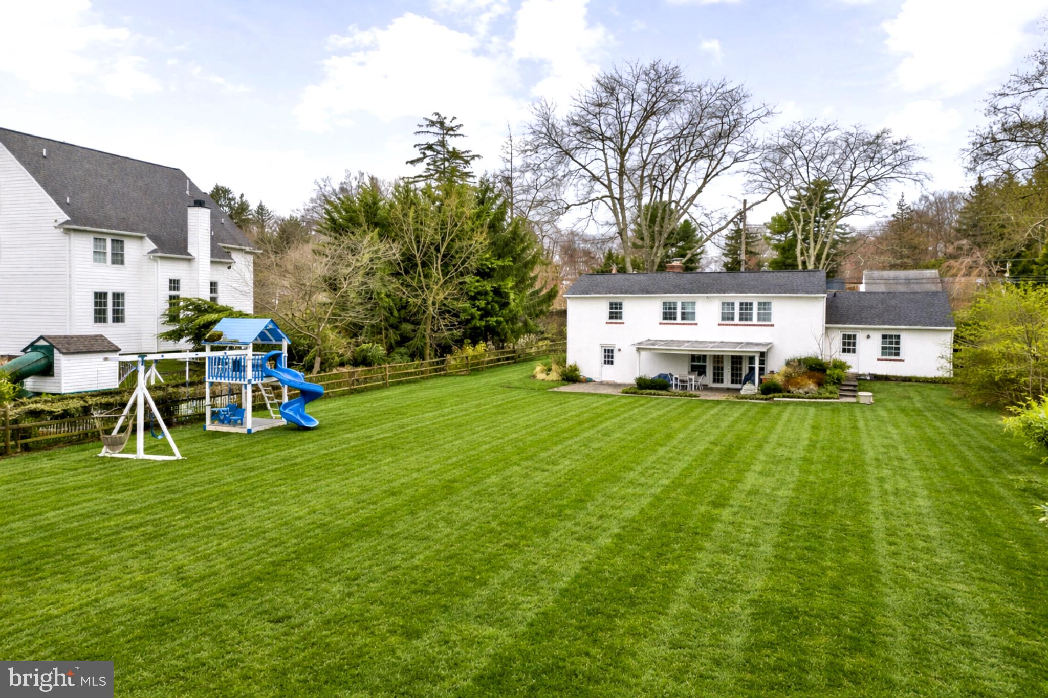 237 Waterloo Avenue Berwyn, PA 19312 - Photo 55 of 58 a view of a house with a yard deck and sitting area