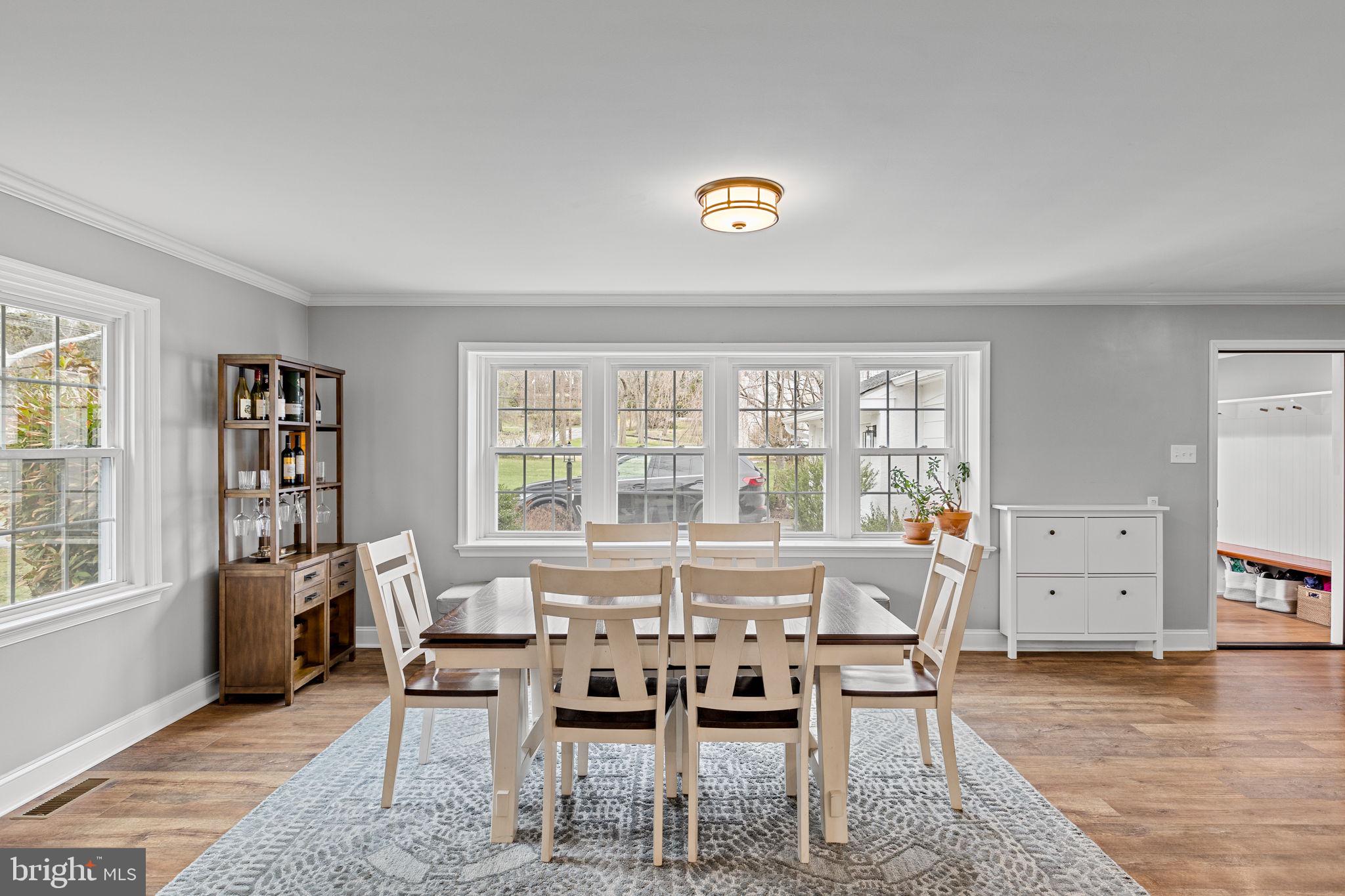 237 Waterloo Avenue Berwyn, PA 19312 - Photo 8 of 58 a view of a dining room with furniture window and wooden floor