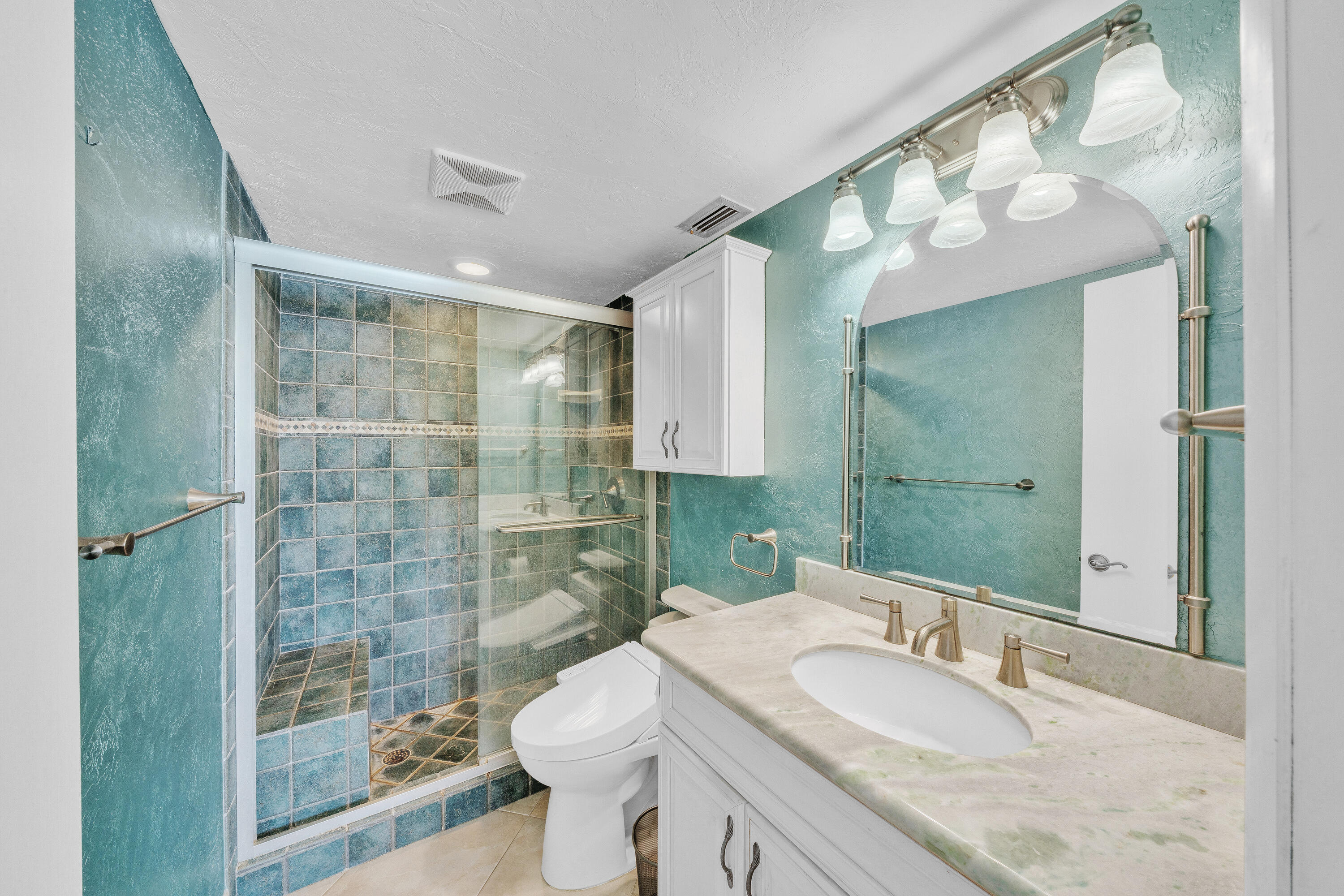 711 Northeast Harbour Terrace, Unit 409 Boca Raton, FL 33431 - Photo 23 of 42 18 Primary Bathroom (1)
