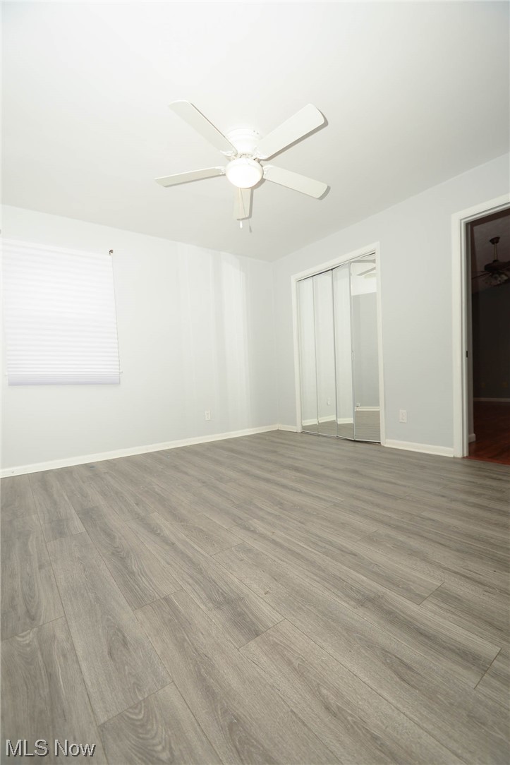 24599 Chardon Road Cleveland, OH 44143 - Photo 18 of 28 Unfurnished room featuring light hardwood / wood-style floors and ceiling fan