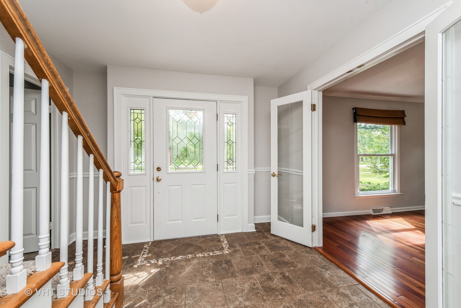 238 Valley Road Trout Valley, IL 60013 - Photo 3 of 41 a view of an entryway with wooden floor and door