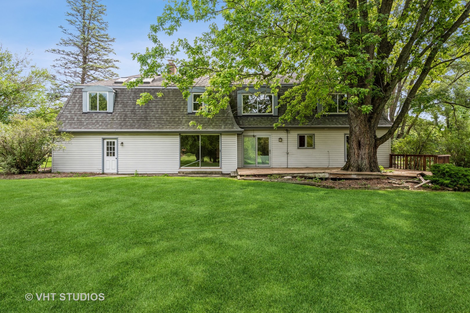 238 Valley Road Trout Valley, IL 60013 - Photo 23 of 41 a front view of house with yard and green space