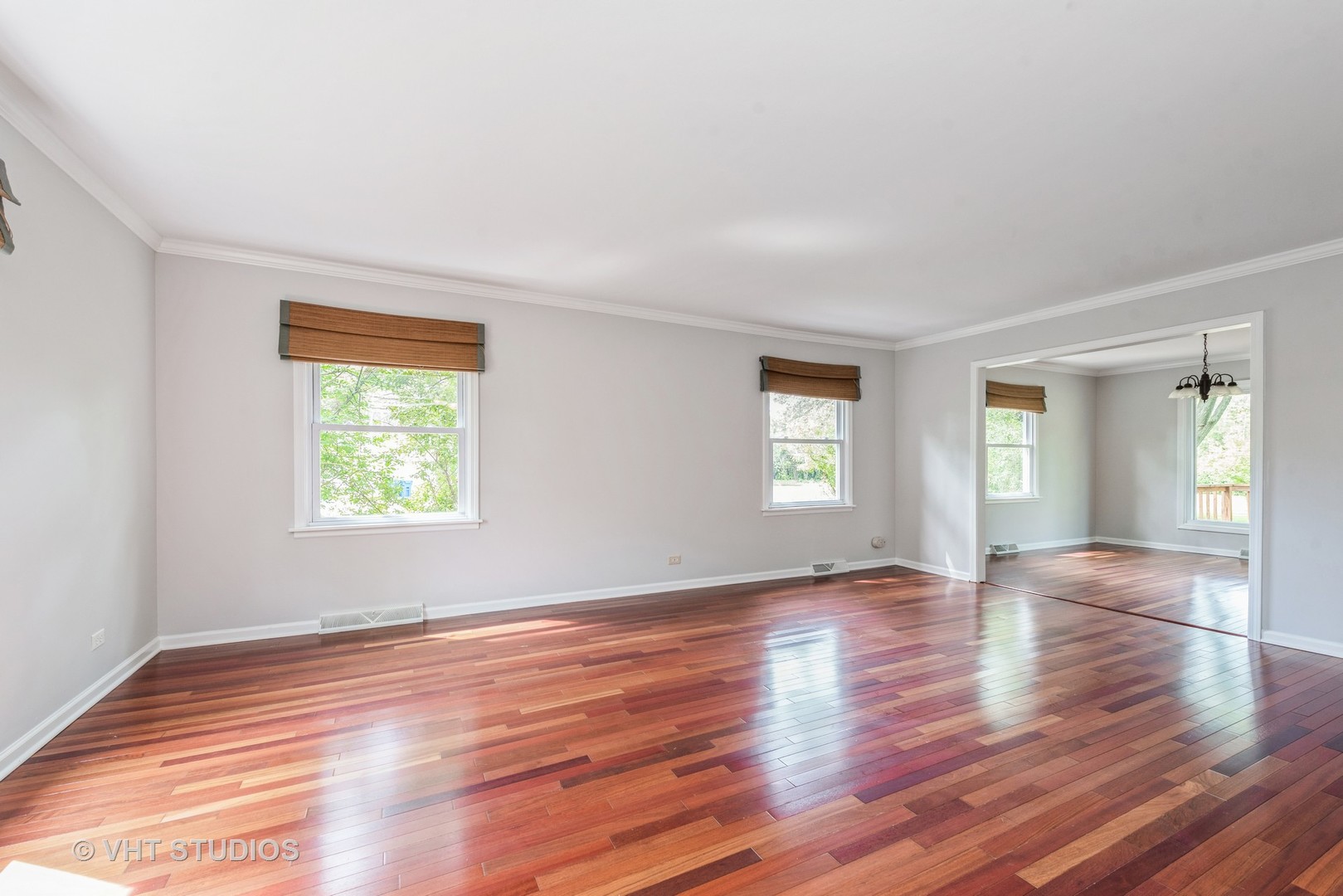 238 Valley Road Trout Valley, IL 60013 - Photo 4 of 41 an empty room with wooden floor and windows