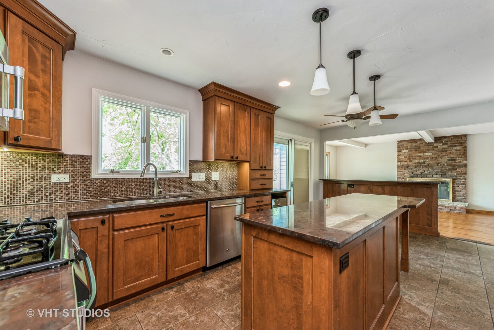 238 Valley Road Trout Valley, IL 60013 - Photo 5 of 41 a kitchen with center island and sink