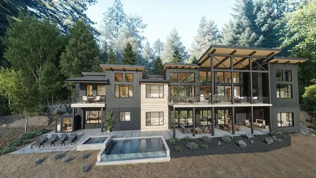 a view of a house with a chairs and table in a patio