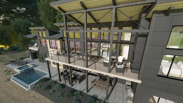 a view of a balcony with chairs and floor to ceiling window