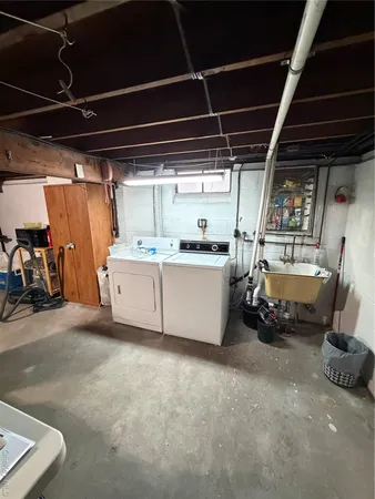 a view of parking garage with cars