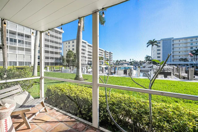 a view of a balcony with chairs