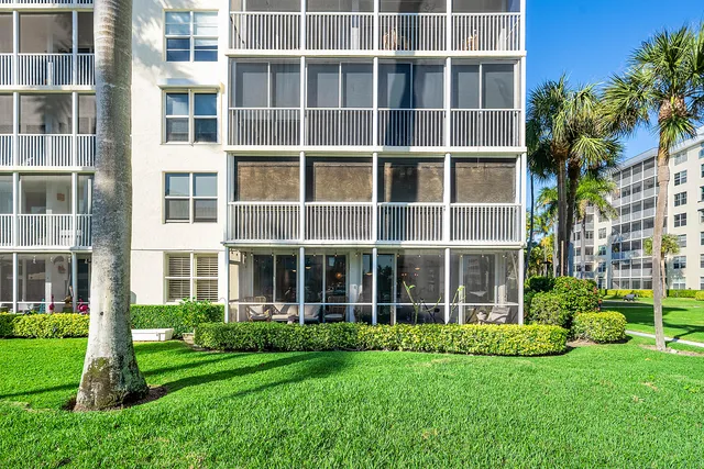a view of swimming pool from a balcony