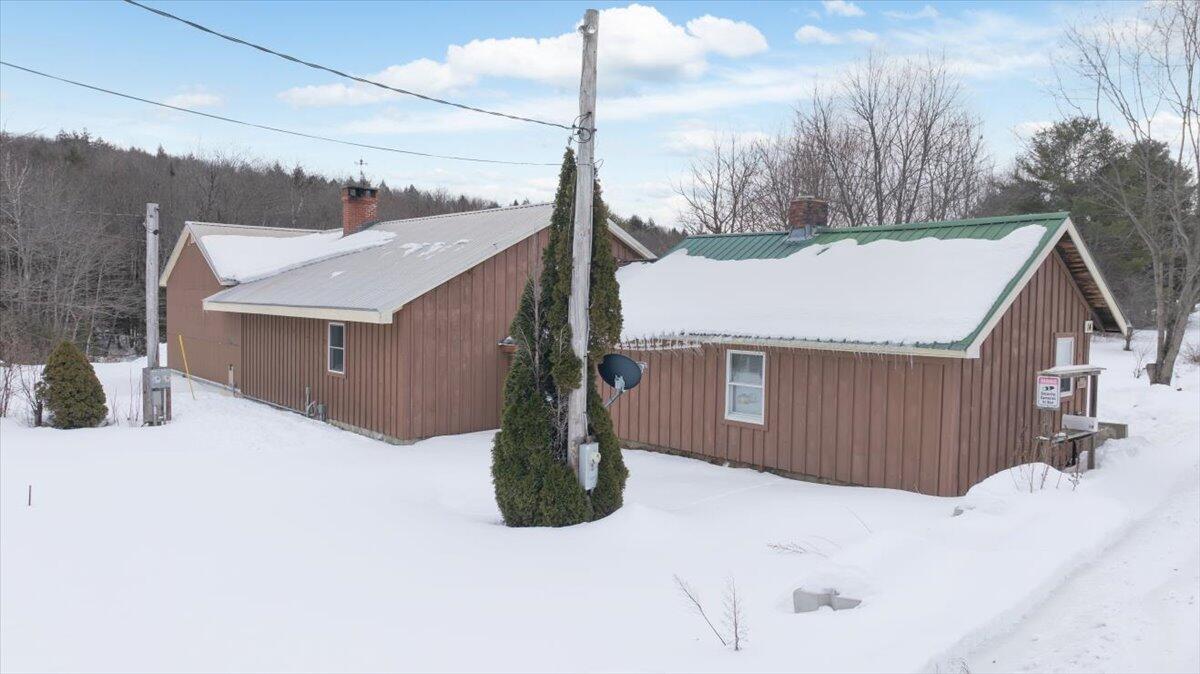 14 McNeil Road Sumner, ME 04292 - Photo 2 of 54 Left side of house