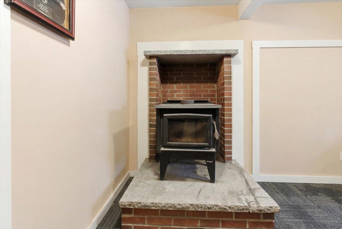 14 McNeil Road Sumner, ME 04292 - Photo 38 of 54 Wood stove in bonus room