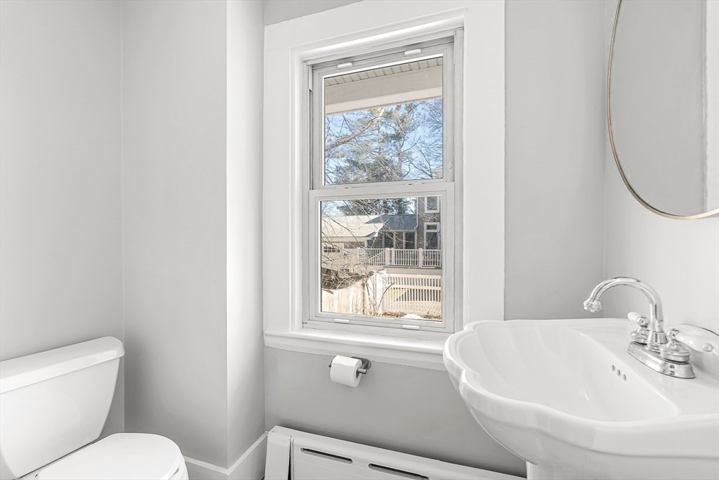 53 Lake Street Winchester, MA 01890 - Photo 15 of 36 a bathroom with a sink and a toilet